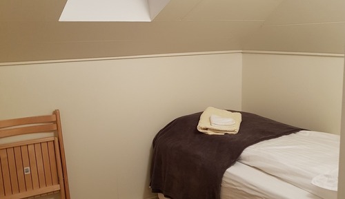 Habitación individual, baño compartido