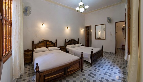 Habitación estándar con 1 cama doble o 2 individuales