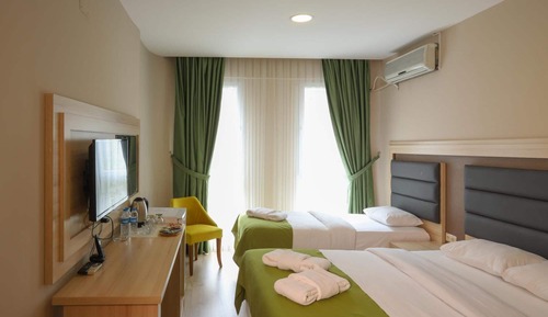 Habitación superior con 1 cama doble o 2 individuales