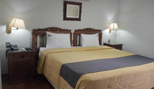 Habitación superior con 1 cama doble o 2 individuales