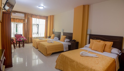 Habitación triple familiar, varias camas