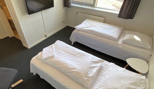 Habitación superior con 1 cama doble o 2 individuales