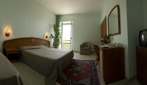 Habitación triple, vistas al mar