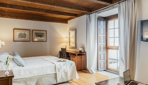 Habitación superior con 1 cama doble o 2 individuales