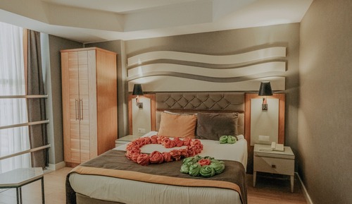 Habitación junior con 1 cama doble o 2 individuales