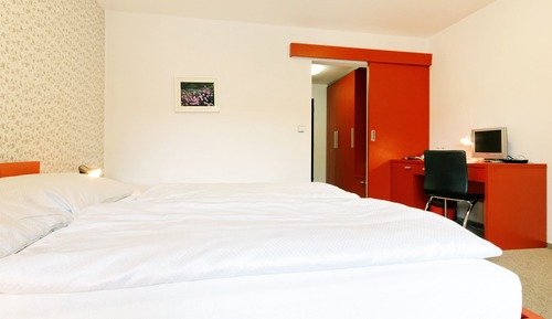 Habitación Deluxe con 1 cama doble o 2 individuales, balcón, en la zona del patio