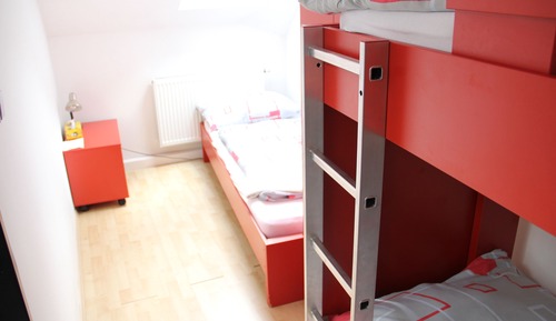 Habitación triple económica, baño compartido