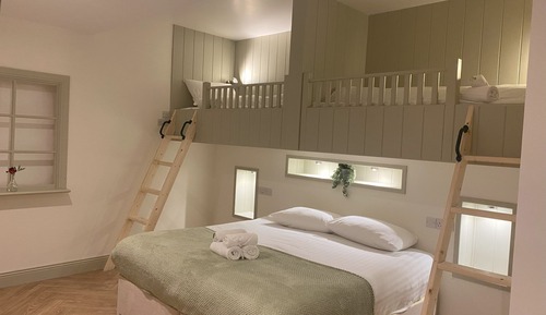 Habitación cuádruple Deluxe