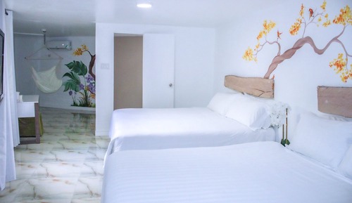 Habitación cuádruple superior, vistas al jardín