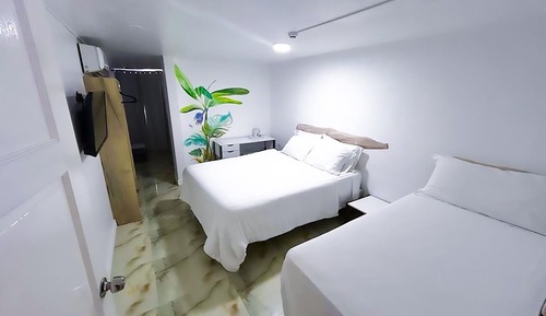 Habitación doble superior, varias camas