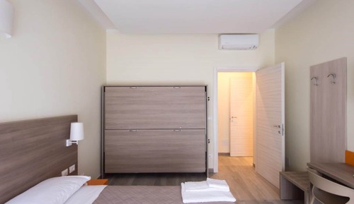 Suite superior, baño privado, vistas a la ciudad