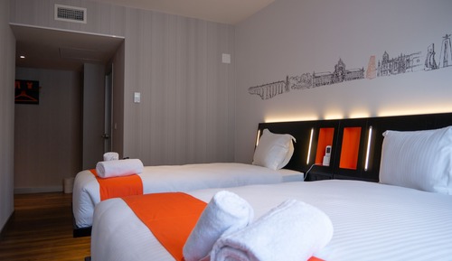 Habitación familiar doble, varias camas