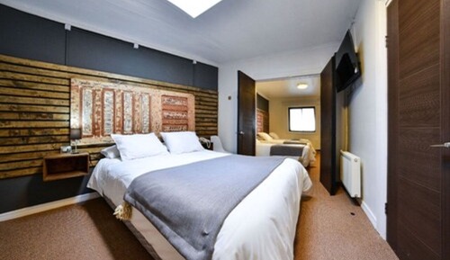 Habitación cuádruple familiar, varias camas