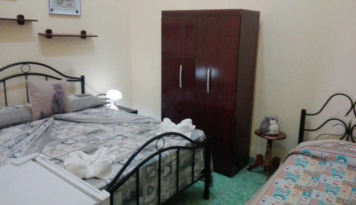 Habitación triple estándar, varias camas