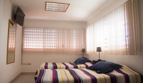 Bungalow Deluxe, varias camas, no fumadores, vistas al jardín