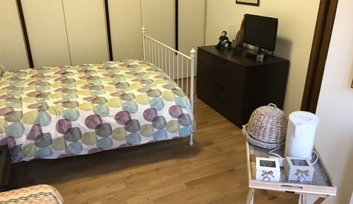 Habitación triple, varias camas
