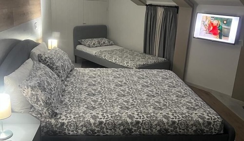 Habitación cuádruple Deluxe