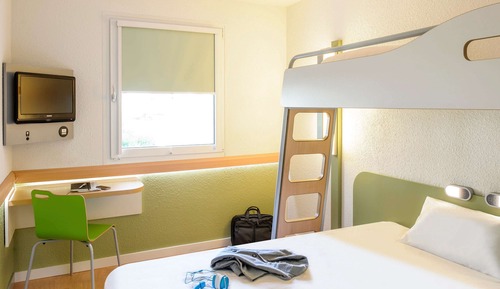 Habitación triple, varias camas