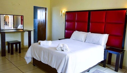 Habitación de lujo con 2 camas individuales, varias camas