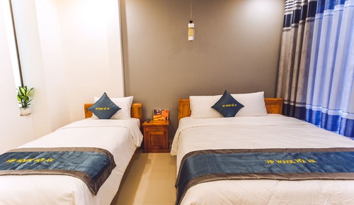 Habitación triple Deluxe, balcón