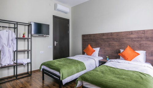 Habitación estándar con 1 cama doble o 2 individuales, vistas a la ciudad
