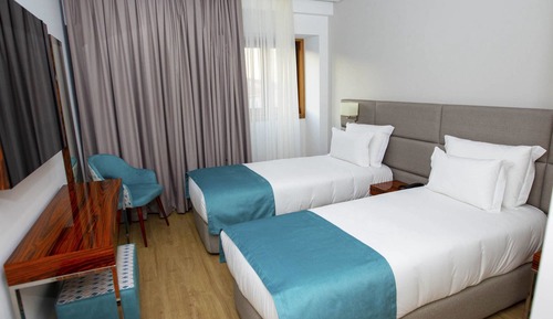 Habitación Deluxe con 1 cama doble o 2 individuales, balcón