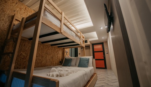 Habitación Deluxe, varias camas