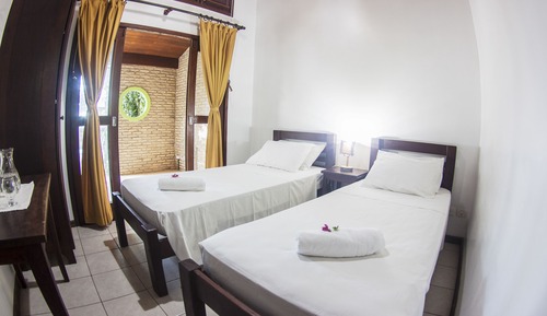 Habitación cuádruple Deluxe, vistas al jardín