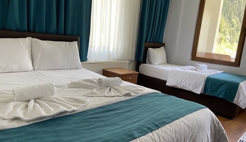 Comfort Uc Kisilik Oda