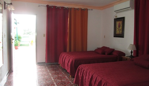 Habitación superior con 1 cama doble o 2 individuales
