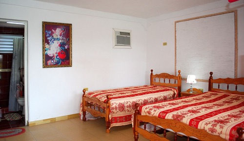 Habitación junior con 1 cama doble o 2 individuales