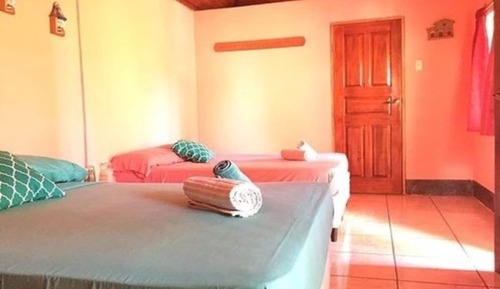 Habitación familiar, varias camas