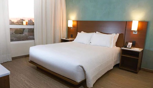 Habitación triple, varias camas