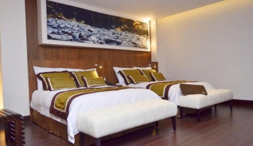 Habitación triple Deluxe