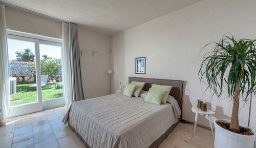 Suite junior, patio, junto a la piscina