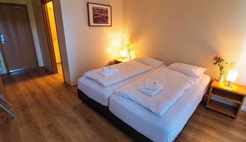 Habitación con 1 cama doble o 2 individuales, baño privado