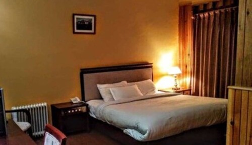 Habitación estándar con 1 cama doble o 2 individuales, no fumadores, baño privado