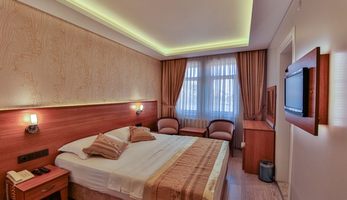 Habitación clásica con 1 cama doble o 2 individuales, vistas a la ciudad