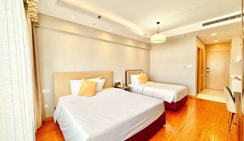 Habitación familiar con 2 camas individuales