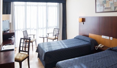 Habitación estándar con 1 cama doble o 2 individuales