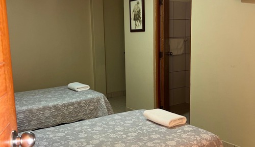 Habitación superior con 2 camas individuales