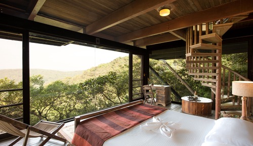 Casa Conforten un árbol, varias camas, vistas al jardín