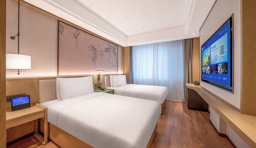 Habitación básica con 2 camas individuales