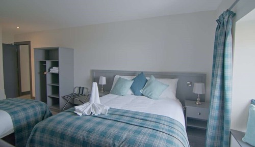 Habitación triple Deluxe