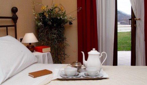 Habitación cuádruple Deluxe, vistas al jardín