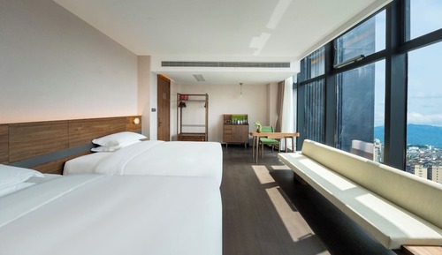 Habitación familiar con 2 camas individuales, vistas a la ciudad