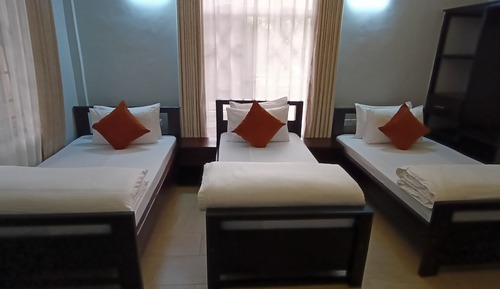 Habitación triple Deluxe, balcón, vistas al jardín