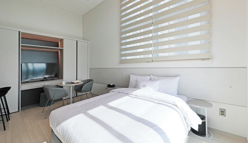 Habitación familiar con 2 camas individuales, vistas a la ciudad