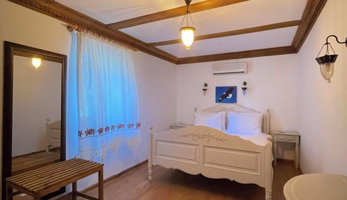 Habitación cuádruple Deluxe, vistas al jardín