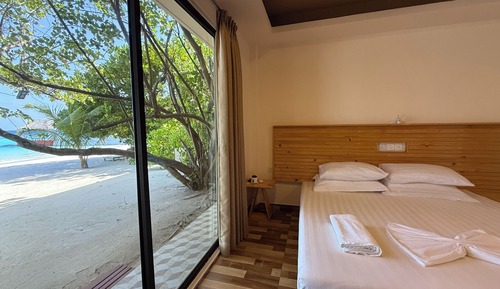 Habitación Deluxe con 1 cama doble o 2 individuales, vistas al mar, frente a la playa